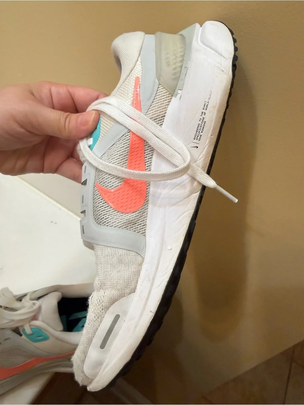 Nike Women’s White Running Shoes with Coral and Teal Accents